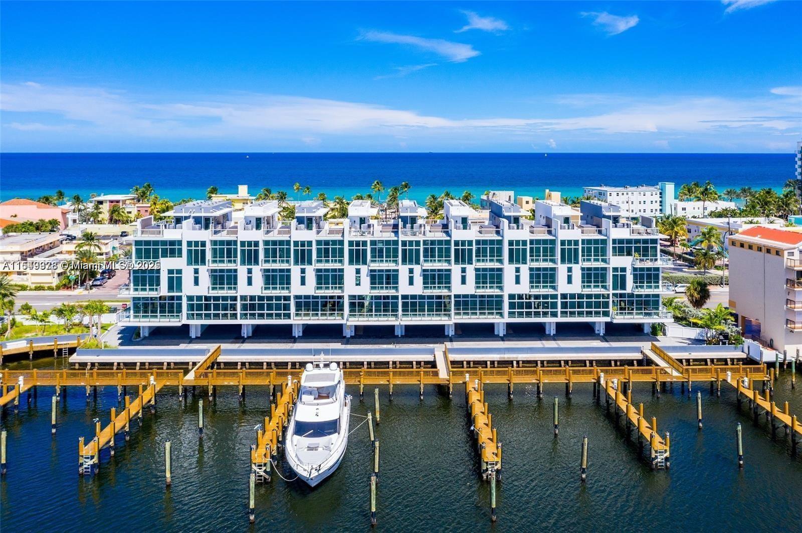 Quint Collection, one of South Florida's most exclusive gated luxury waterfront townhome communities. Breathtaking views of the Atlantic Ocean to the east & Intracoastal water views to the west. This 5 story modern residence features the latest in home automation, custom Italian chef kitchen by Italkraft, Gaggenau appliances, porcelain floors, glass elevator, 10 Ft ceilings, & a primary suite occupying entire floor with 2 balconies. Sky deck with summer kitchen, jacuzzi & outdoor shower. Sale includes a 60 Ft dock with Ocean access & no fixed bridges. Only steps away from white sandy beaches, waterfront dining & just minutes to downtown Hollywood, Hardrock Casino & positioned between Fort Lauderdale & Miami. Quint Collection is a redefinition of luxury focused on convenience & simplicity.