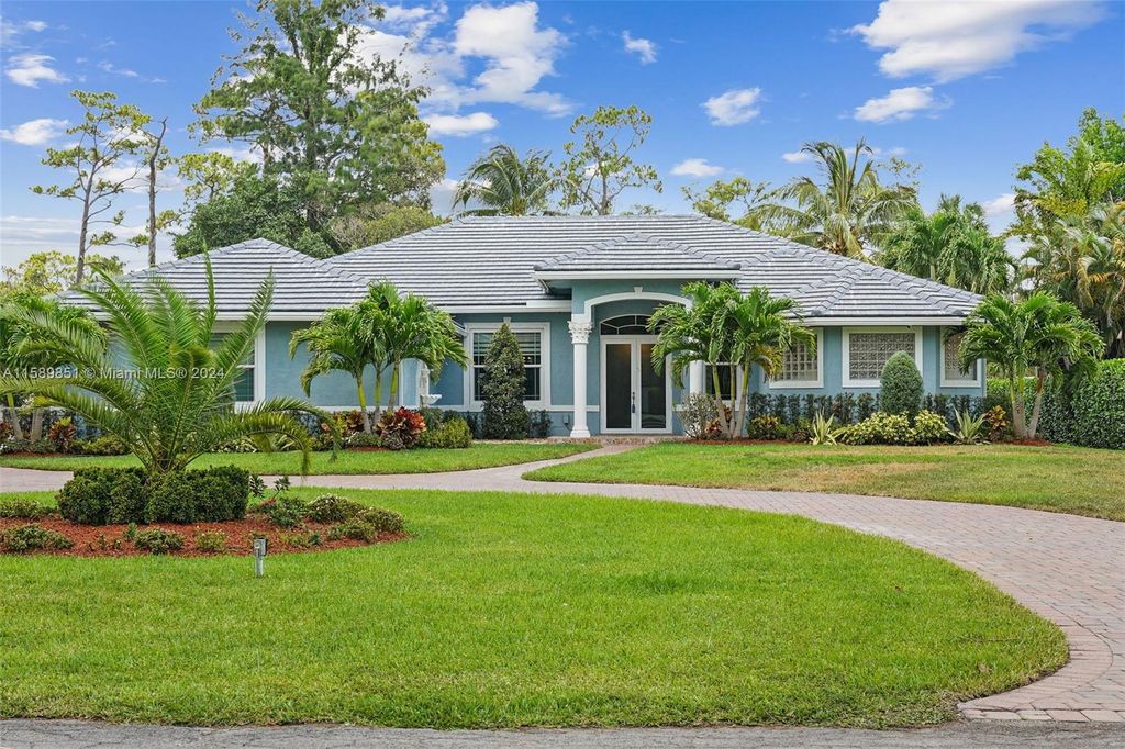 Photo of 5730 NW 66th Way, Parkland, FL 33067 (MLS # A11589851)