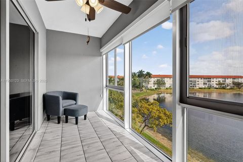 Photo of 13100 SW 11th Ct #407C, Pembroke Pines, FL 33027 (MLS # A11950123)