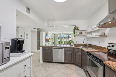 Photo of 3150 N Course Ln #108, Pompano Beach, FL 33069 (MLS # A11891122)