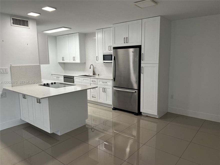 Beautifully updated and located in a prime Dadeland location, this ground-floor unit offers easy first floor access, comfort and beautiful living by design with exciting improvements underway for the complex. Kingston Square, a popular gated community, is currently undergoing a major revitalization, including new metal roofs, stucco, paint, pipe lining, landscaping, wireless internet, asphalt in parking lot and updated amenities including a library and a clubhouse.  The sellers have completely paid off the special assessment funding everything, giving the buyer financial peace of mind. The community is currently offering all owners the option of a 5-year, interest-free loan for anyone wanting impact windows and doors, with the cost for this unit estimated at about 6K.  

Inside, the upgrades continue. The remodeled unit features a new Bosch smart washer and dryer, new dishwasher, newer A/C and water heater, and new premium lighting fixtures in the living room and primary suite. This unit is one of the few with it's own private, screened balcony/porch overlooking the gardens and the pool area. New Zebra shades throughout add a modern touch.

As if all the improvements and upgrades weren't enough, one of the best features about this unit is its central Dadeland location, where you can access major routes in any direction in just minutes.  Close to Baptist Hospital, incredible shopping and dining, Metrorail, major highways and more.  Great location, easy to show!