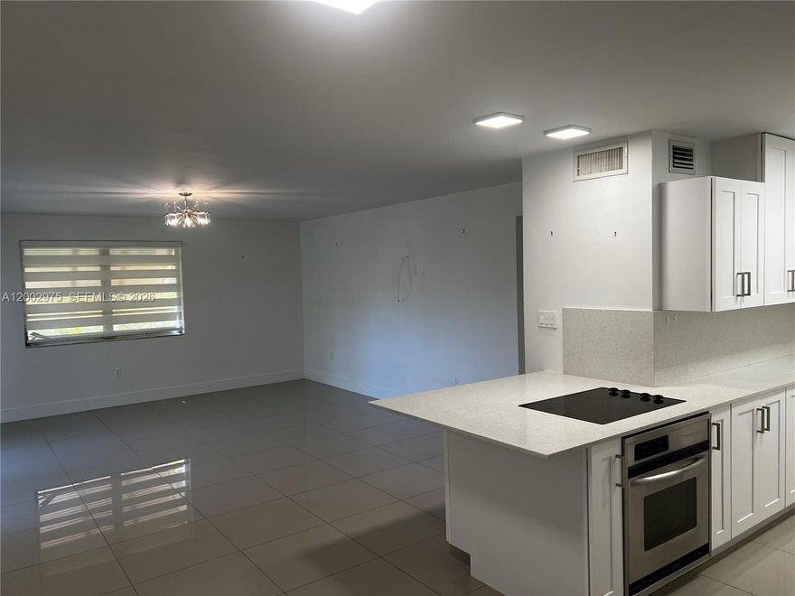 Beautifully updated and located in a prime Dadeland location, this ground-floor unit offers easy first floor access, comfort and beautiful living by design with exciting improvements underway for the complex. Kingston Square, a popular gated community, is currently undergoing a major revitalization, including new metal roofs, stucco, paint, pipe lining, landscaping, wireless internet, asphalt in parking lot and updated amenities including a library and a clubhouse.  The sellers have completely paid off the special assessment funding everything, giving the buyer financial peace of mind. The community is currently offering all owners the option of a 5-year, interest-free loan for anyone wanting impact windows and doors, with the cost for this unit estimated at about 6K.  

Inside, the upgrades continue. The remodeled unit features a new Bosch smart washer and dryer, new dishwasher, newer A/C and water heater, and new premium lighting fixtures in the living room and primary suite. This unit is one of the few with it's own private, screened balcony/porch overlooking the gardens and the pool area. New Zebra shades throughout add a modern touch.

As if all the improvements and upgrades weren't enough, one of the best features about this unit is its central Dadeland location, where you can access major routes in any direction in just minutes.  Close to Baptist Hospital, incredible shopping and dining, Metrorail, major highways and more.  Great location, easy to show!