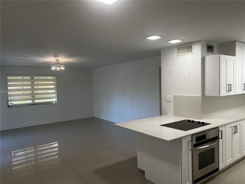 Photo of 9350 SW 77th Ave #G1, Miami, FL 33156 (MLS # A12002975)