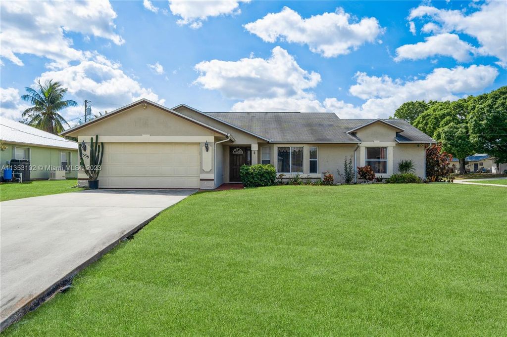 Photo of 1538 SW Jacqueline Ave, Port Saint Lucie, FL 34953 (MLS # A11353102)