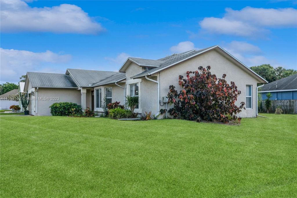 Photo of 1538 SW Jacqueline Ave, Port Saint Lucie, FL 34953 (MLS # A11353102)