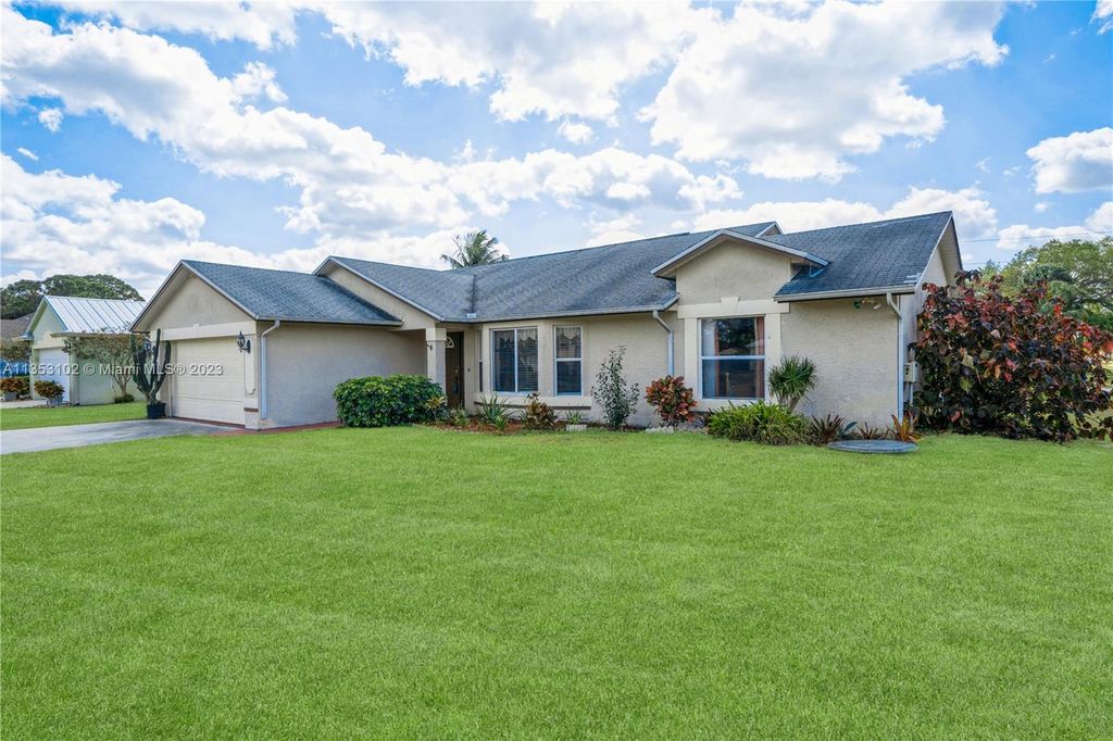 Photo of 1538 SW Jacqueline Ave, Port Saint Lucie, FL 34953 (MLS # A11353102)