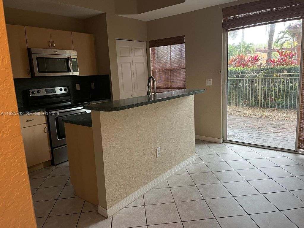 Photo of 4952 Tradewinds Ter #506, Dania Beach, FL 33312 (MLS # A11985732)