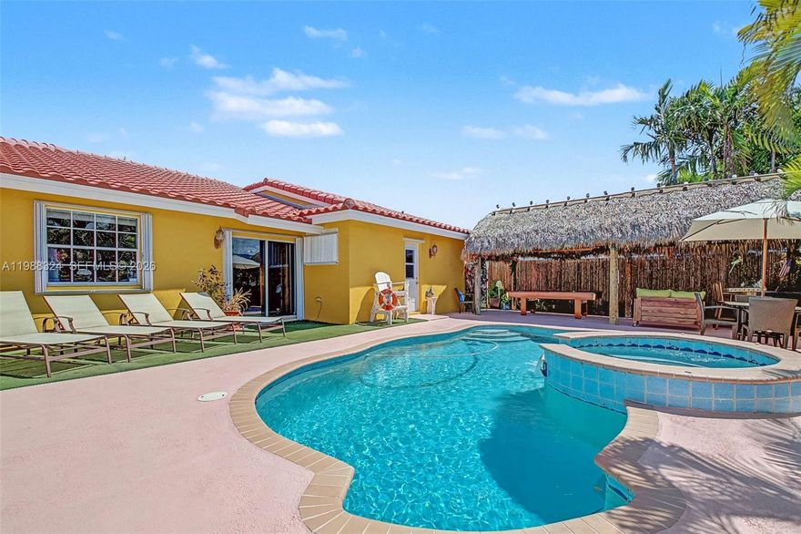 Welcome to this inviting 3-bedroom, 2-bathroom home nestled in the desirable Cutler Bay community of Chanterelle by the Bay. Offering 1,193 sq ft of living space and 1,459 total sq ft on a 5,500 sq ft lot, this home is perfect for families seeking comfort, convenience, and a great neighborhood feel.A welcoming foyer leads into bright living and dining areas filled with natural light, with lovely views of the pool and backyard; ideal for everyday living and family gatherings. The primary bedroom features a spacious remodeled cabana-style bathroom with direct access to the pool area and a walk-in closet.Step outside to a true backyard retreat where kids and adults alike can enjoy the swimming pool, tiki bar, and even a pool table; perfect for weekend barbecues, celebrations, or simply relaxing at home. Additional features include a roof replaced in 2015, washer and dryer conveniently located in the garage, accordion/panel shutters for peace of mind, a wood-fenced yard for privacy, and a 1-car garage. Located near great schools and just minutes from parks, bike paths, and top outdoor destinations; including Black Point Marina, Lakes by the Bay, and Saga Bay Park—offering endless opportunities for family fun and outdoor activities.