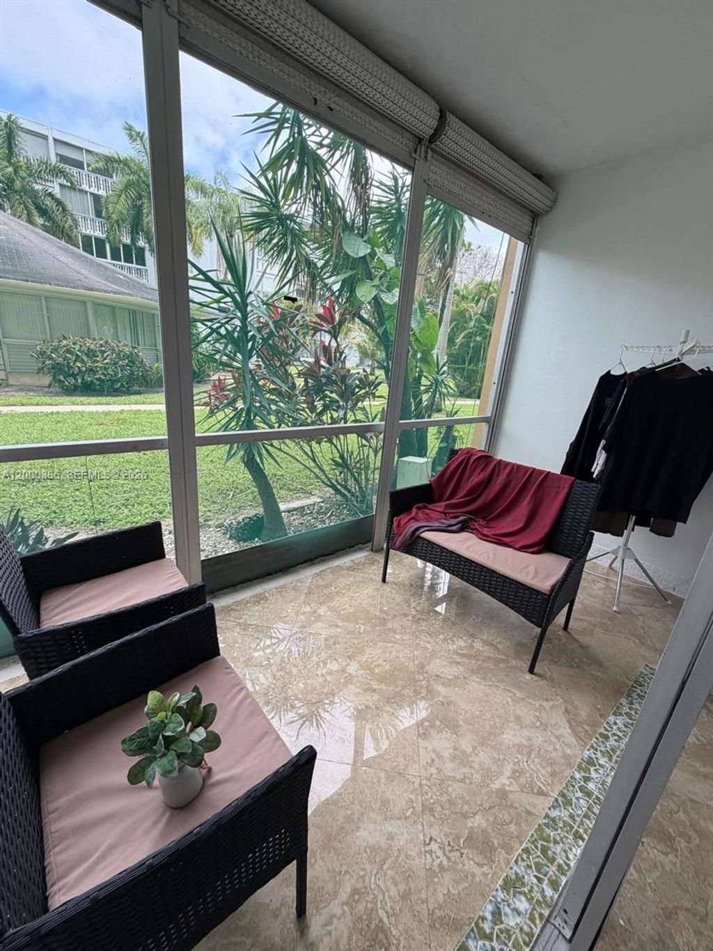 Photo of 219 NE 14th Ave #101, Hallandale Beach, FL 33009 (MLS # A12000386)