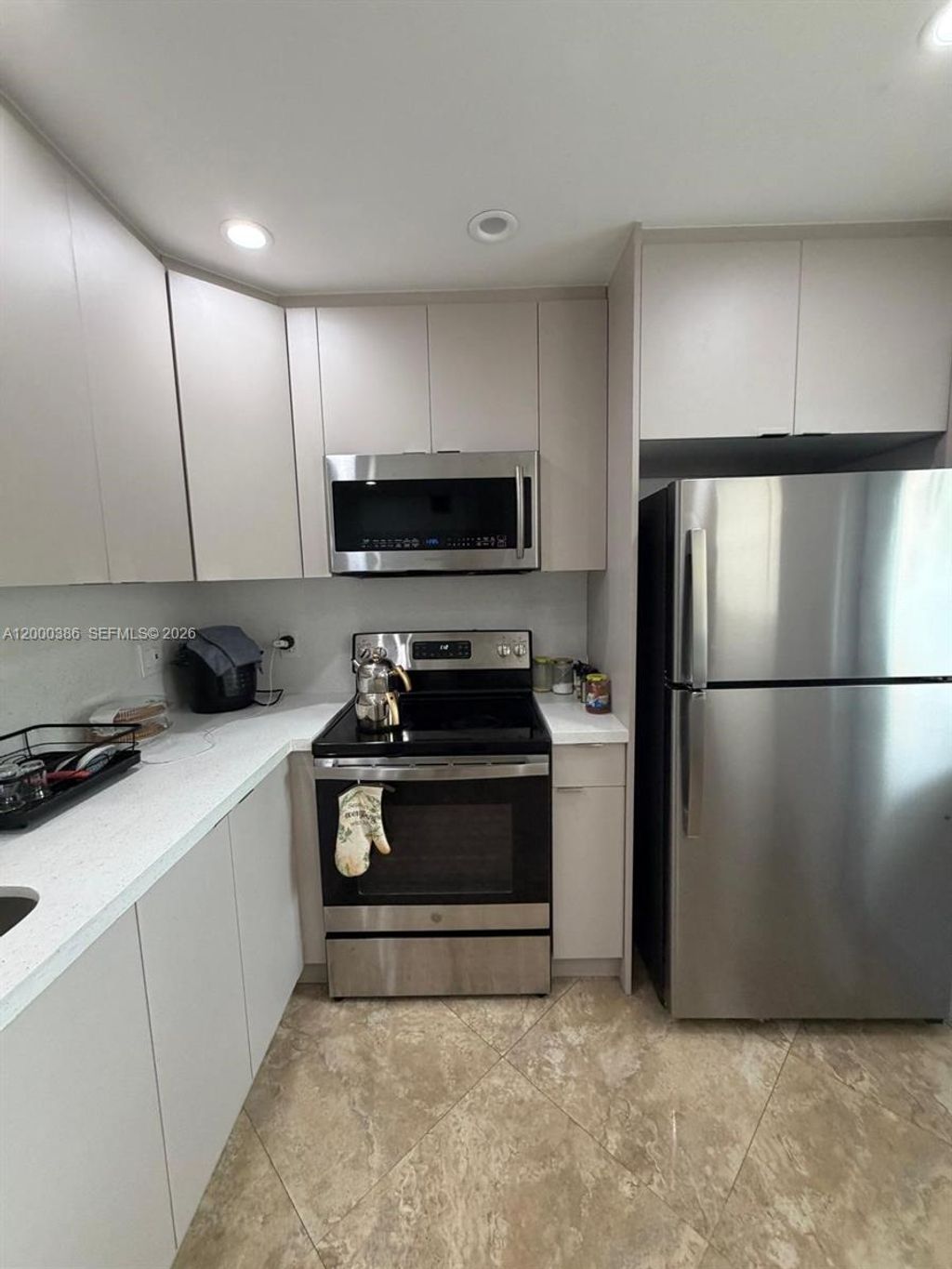 Photo of 219 NE 14th Ave #101, Hallandale Beach, FL 33009 (MLS # A12000386)