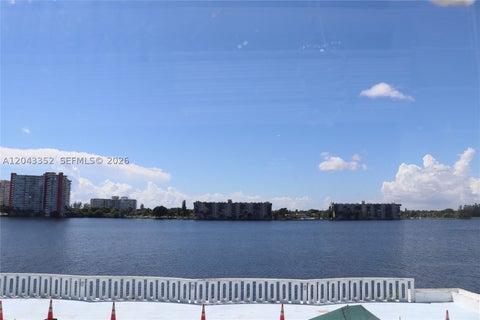 Photo of 1150 NE 191st St #37, Miami, FL 33179 (MLS # A12043352)