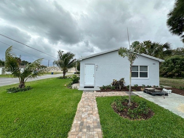 Photo of 101 W 11th St #2, Riviera Beach, FL 33404 (MLS # A12015564)