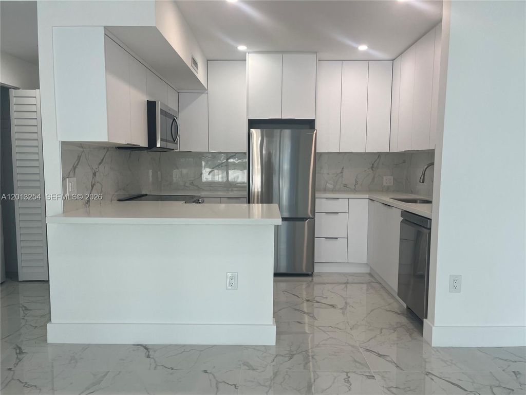 Photo of 3505 S Ocean Dr #210, Hollywood, FL 33019 (MLS # A12013254)