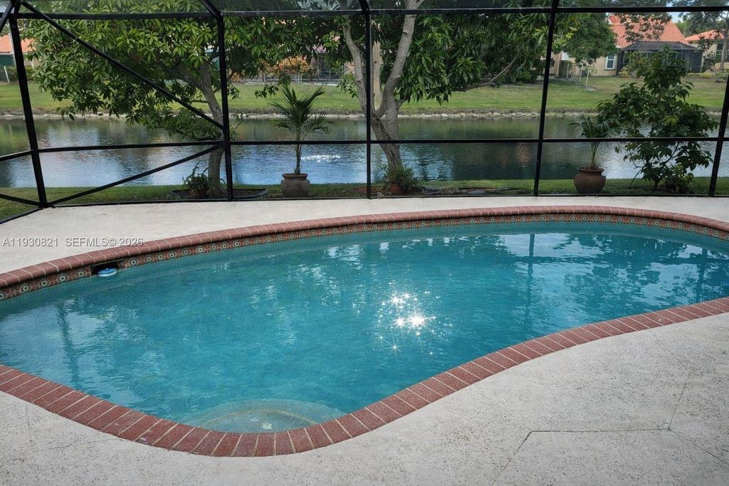 Photo of 8091 Nadmar Ave, Boca Raton, FL 33434 (MLS # A11930821)