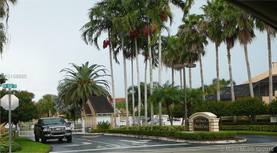 Is Big, Bright, Spacious 2 story beautiful townhouse,3 bedrooms 2.5 baths, car garage in very desirable Doral Cove. Tiled 1st floor and carpeted from the stairs up. Washer&Dryer on 1st floor, screened back patio. well kept house, gated community. Close to great A+ schools, Doral Country Club, malls, highways, with endless amenities. Year 2014 New Roof!  Seller's apply Firpta. Buyer's offer must include background check.  Buyer and Buyer's Agent must verify info with Association & Miami-Dade County.