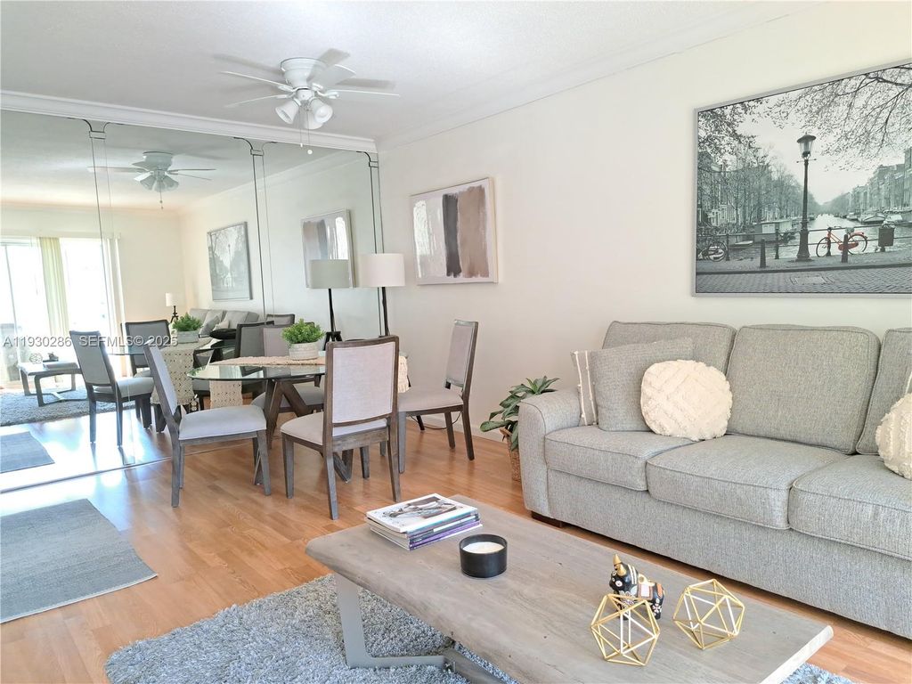 Photo of 450 Golden Isles Dr #3C, Hallandale Beach, FL 33009 (MLS # A11930286)