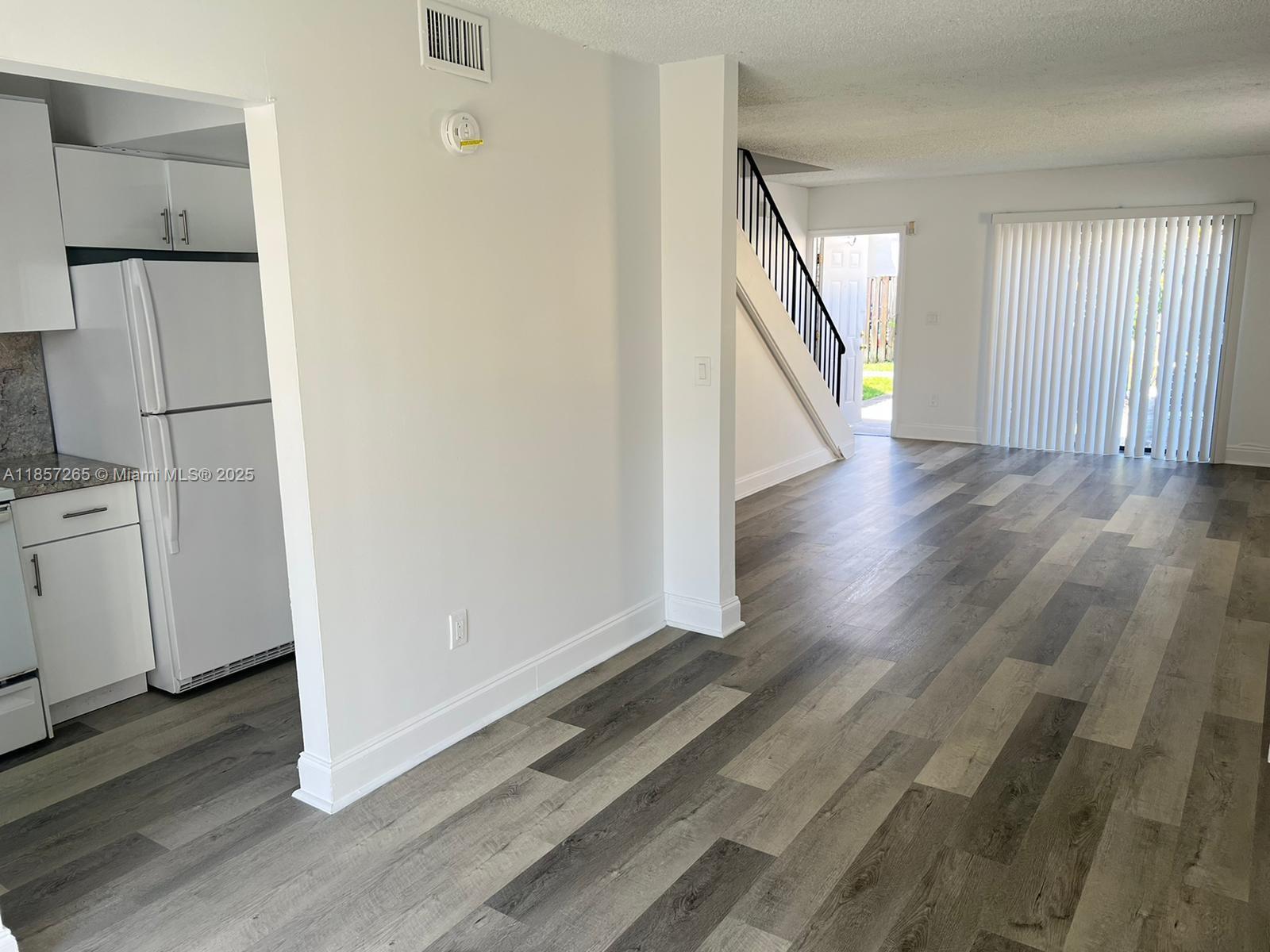 Completely renovated townhouse, 2 bedrooms upstairs with a shared full bathroom, living-dining room, kitchen, and half bathroom downstairs. Closed patio. Central AC. Washer and dryer inside. New flooring throughout the unit. The unit is rented for $1,825.00 until June 2026.