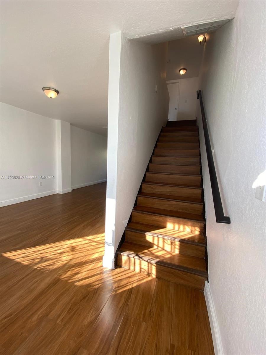 Bright 2 story , 3 bed 2 full baths. Nice small backyard, washer and dryer inside, spacious bedrooms, functional kitchen. Fast access to highways. Central A/C .Impact windows and doors. First, and last months rent plus security deposit required. For a faster response please text listing agent.