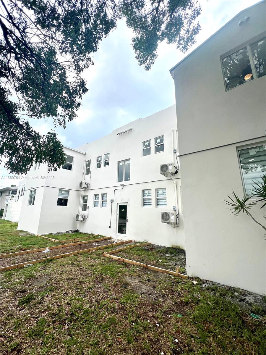 Step into this fully remodeled, bright, and modern apartment with the highest-end finishes. This stunning unit features marble floors, a sleek kitchen with modern appliances, and updated bathroom. Enjoy peace of mind with hurricane impact windows and doors. This apartment is ready for immediate occupancy and includes one parking space. Located east of I-95 in a quiet neighborhood, this is a prime location you won't want to miss!