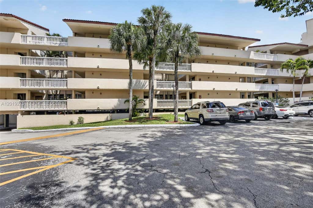 Photo of 7041 Environ Blvd #327, Lauderhill, FL 33319 (MLS # A12019275)