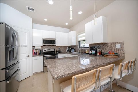 Tiny photo for 340 NE 194th Ln, Miami, FL 33179 (MLS # A11977244)