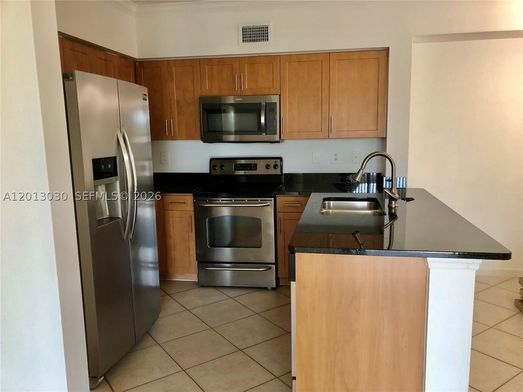 Photo of 6559 Emerald Dunes Dr #304, West Palm Beach, FL 33411 (MLS # A12013030)