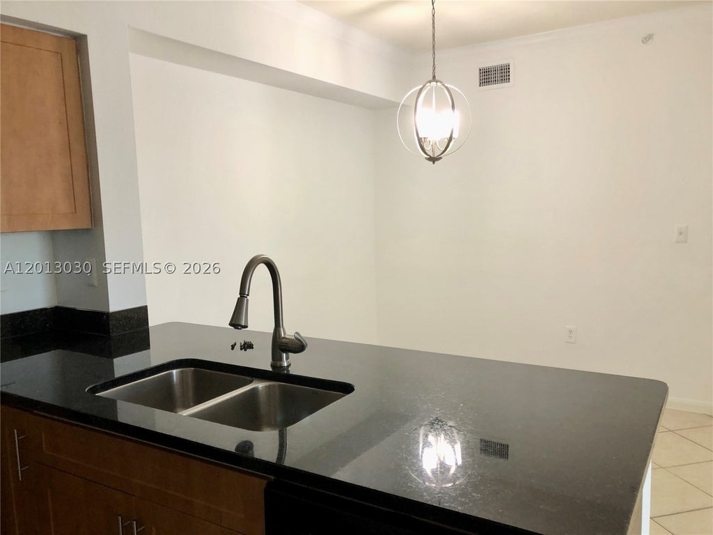 Photo of 6559 Emerald Dunes Dr #304, West Palm Beach, FL 33411 (MLS # A12013030)