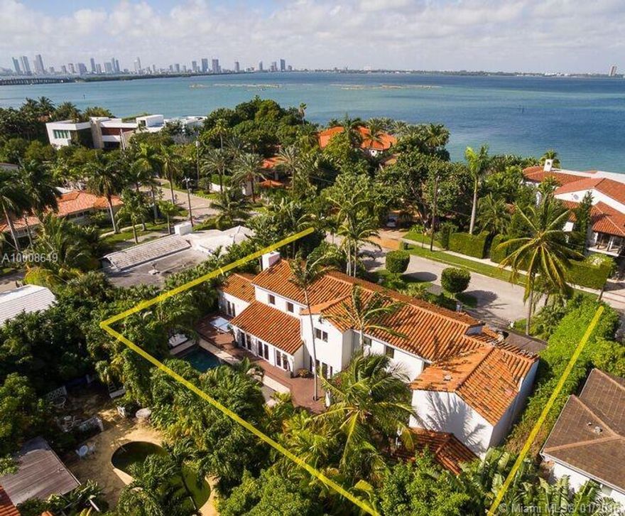 This iconic North Bay Road villa was completely renovated in 2009. While exuding a classic Spanish Mediterranean style, the 5BD/5BA/2halfBA open floor plan offers a modern lifestyle with: impact windows + doors, Sonos + Crestron, custom kitchen w/ Subzero + Viking (Calacatta island+ countertops), master suite w/ sauna, 2 second floor guest rooms w/ en-suite baths, summer kitchen, media room, gated entry, 2-car garage, 12,000SF lot. Wood floors throughout. Ideal family residence or tropical getaway.