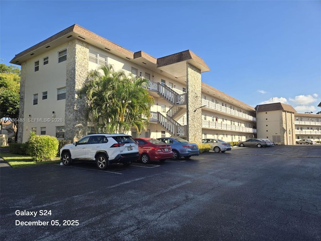 Photo of 5181 W Oakland Park Blvd #102, Lauderdale Lakes, FL 33313 (MLS # A11986488)