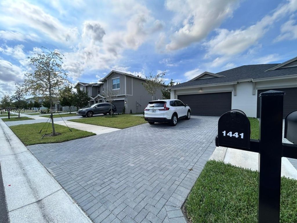 Photo of 1441 Haywagon Trl #1441, Loxahatchee, FL 33470 (MLS # A11911227)