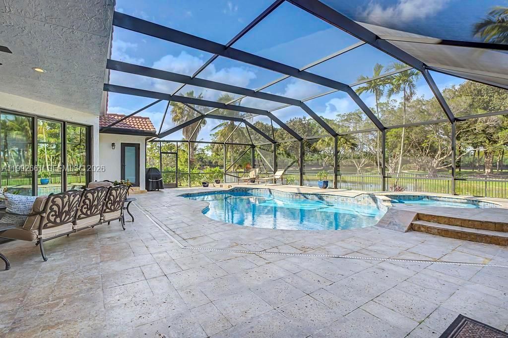 Photo of 343 Coconut Cir, Weston, FL 33326 (MLS # A11992661)