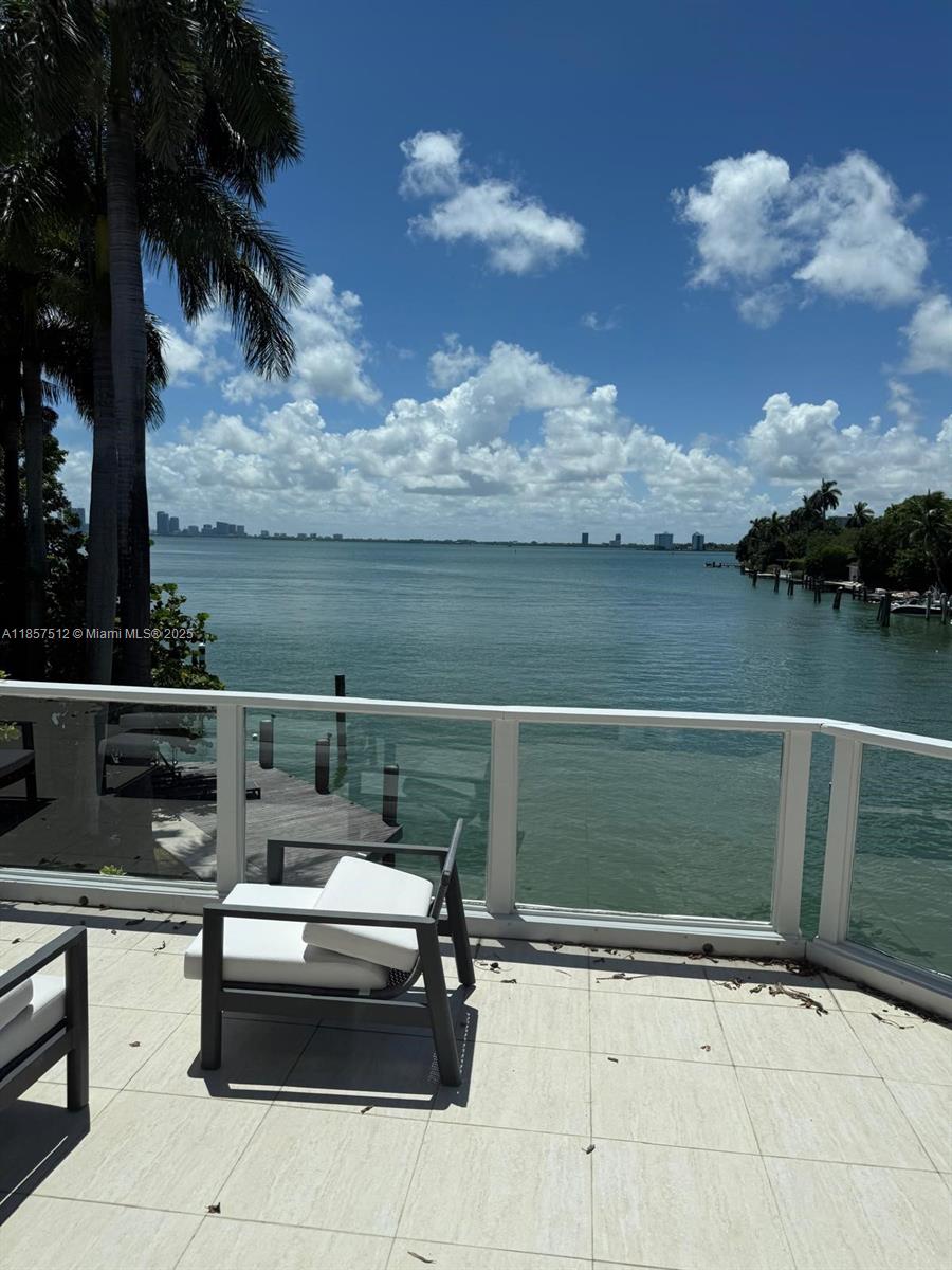 Live in elegance at 6500 N Bay Rd, a premier Miami Beach waterfront estate with panoramic Biscayne Bay and Miami skyline views. This spacious residence features soaring ceilings, floor-to-ceiling glass, and an open layout that floods the home with natural light. A chef’s kitchen, 7 luxurious bedrooms, and multiple entertaining areas offer comfort and style. Step outside to a generous bayfront terrace and private dock and boat lift, perfect for boating and enjoying stunning sunsets. Located on one of the most prestigious streets in Miami Beach, minutes from fine dining, shopping, and the beach.