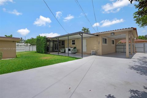 Single Family Residence in Hialeah FL 5590 6th Ave Ave 28.jpg