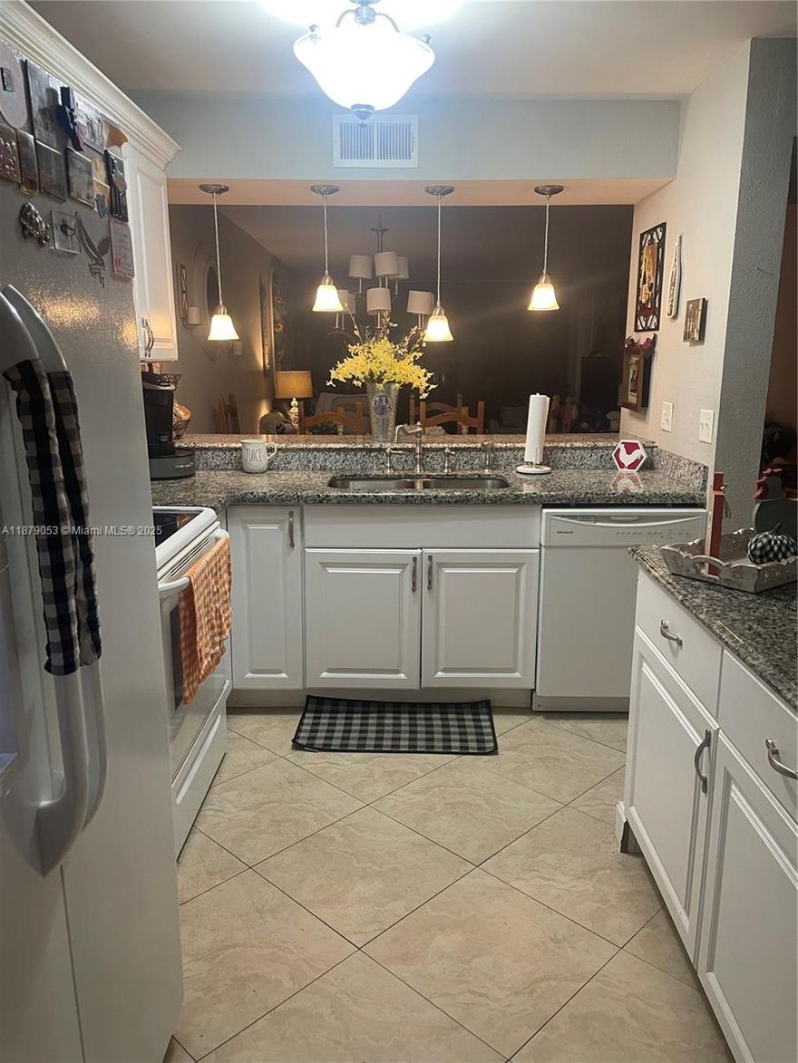 Beautifully updated corner unit in the 55+ community of Coral Gate, located in the heart of Margate. This spacious condo offers 2 bedrooms, 2 bathrooms, a remodeled kitchen and modern neutral tile flooring throughout with an In-unit washer and dryer.  Conveniently located near the elevator, this home is close to hospitals, major highways and lots of shopping and dining options.
