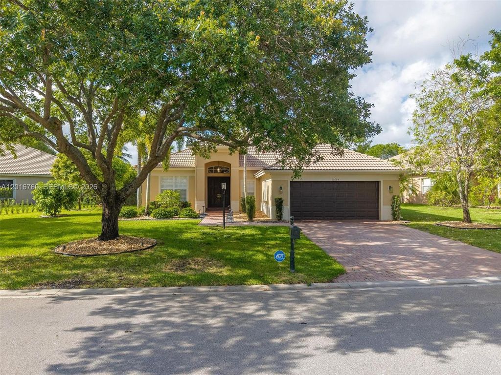 Photo of 10684 NW 64th Ct, Parkland, FL 33076 (MLS # A12016760)