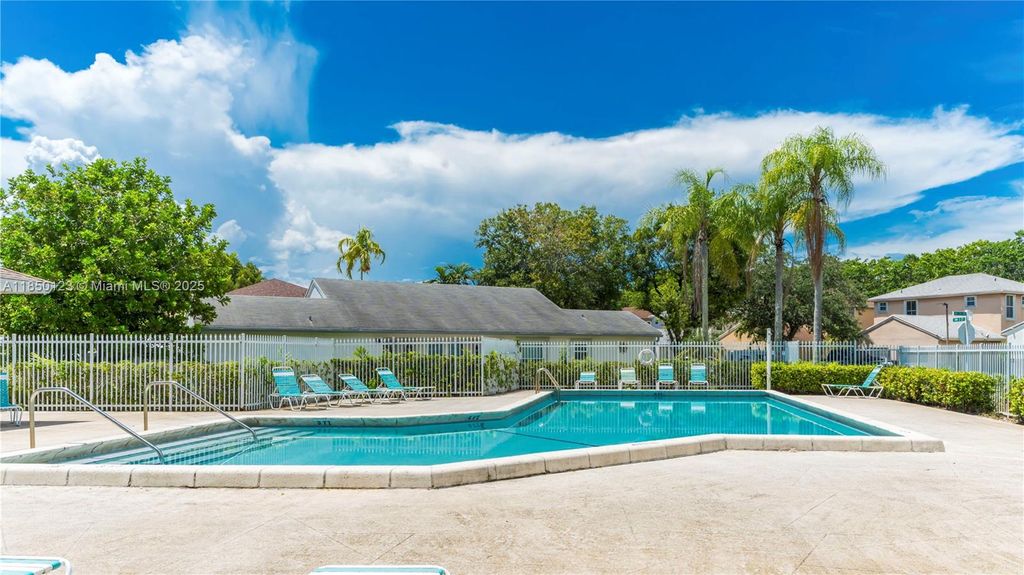 Photo of 301 NW 207th Ave, Pembroke Pines, FL 33029 (MLS # A11850123)