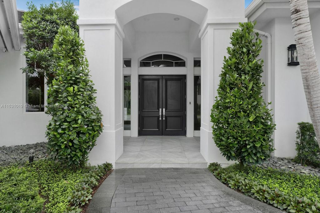 Photo of 434 Areca Palm Rd, Boca Raton, FL 33432 (MLS # A11531019)