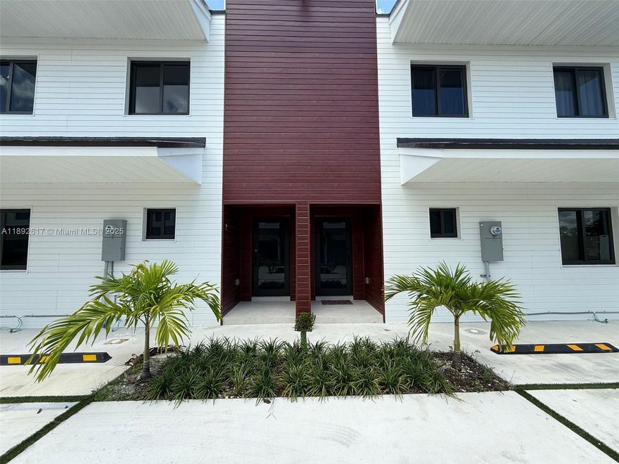 Beautiful New Construction - Townhome in Florida City! Be the first to live in this stunning, spacious two-story townhome offering modern design & comfort throughout. Enjoy open-concept living areas with gorgeous oak-colored laminate flooring that flows seamlessly from room to room. The stylish kitchen features stainless steel appliances, white cabinetry, and sleek quartz countertops, perfectly positioned to overlook the inviting living spaces—ideal for everyday living & entertaining. Step outside to a cozy private patio, perfect for gatherings with friends or simply relaxing. This home offers 4 generously sized bedrooms and 3 full bathrooms, providing ample space for family or guests. Additional highlights include impact windows throughout & the convenience of an in-unit washer and dryer.