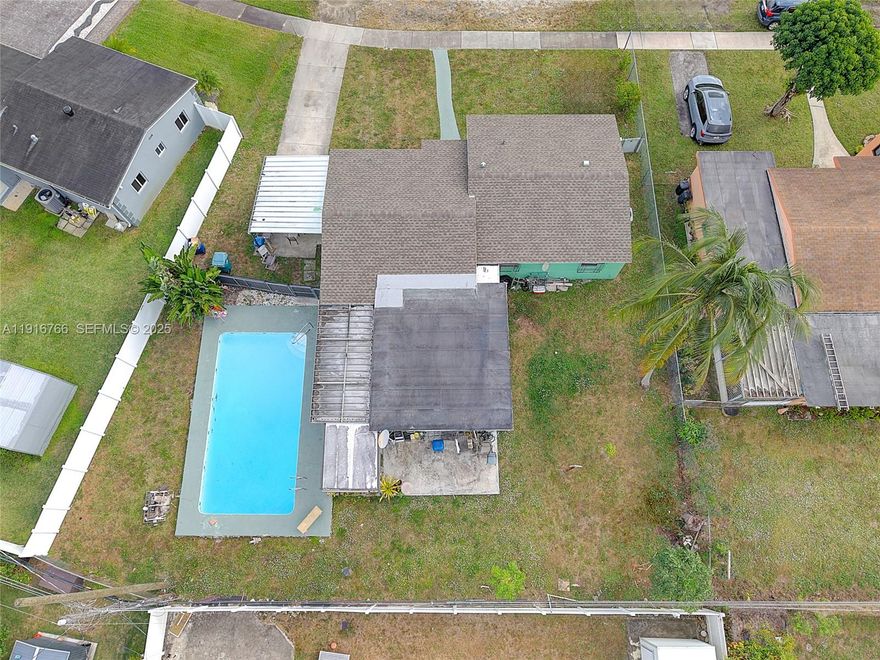 Come discover this wonderful Opportunity in Miami Gardens. Welcome to this spacious single-family home with a large pool and separate in-law quarters, ideally located on a quiet street just minutes from Hard Rock Stadium. Whether you’re looking for a primary residence, an investment property, or a multi-generational living option, this home offers tremendous potential.

The property features: 
New roof installed less than a year ago. Generous lot with ample parking and room to expand. Private pool area perfect for entertaining. In-law suite ideal for guests, rental income, or extended family. 

While the home does need some TLC and updating, the layout and location make it a worthy investment. Bring your vision—and unlock the opportunity this home has to offer.

Property is sold AS-IS and priced accordingly.