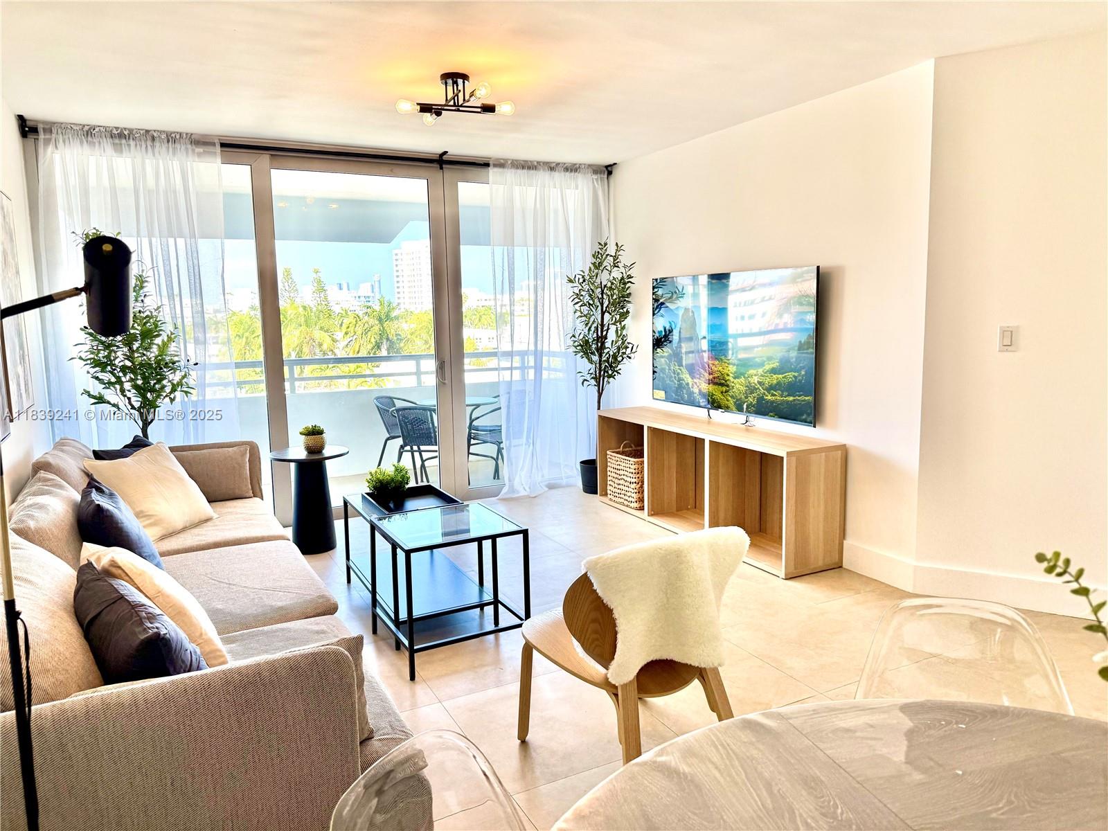 Gorgeous apartment, tastefully renovated with brand new furnitures, in the heart of Bay Harbor Islands! This charming 1 bedroom, 1 den, 1 bath, 1/2 bath is filled with natural light and features brand new impact windows, a modern kitchen with granite countertops and stainless steel appliances, and a lovely balcony. The spacious primary bedroom includes an en-suite full bathroom and a walk-in closet. The Den offers a street view a desk and a twin bed. There is also a Welcoming Powder room and one assigned parking spot. Building amenities include a swimming pool, sauna, and laundry facilities. Ideally located within walking distance to top-rated schools, places of worship, parks, markets, restaurants, banks, Bal Harbour Shops, the beaches, and more! . Additional parking available for rent.