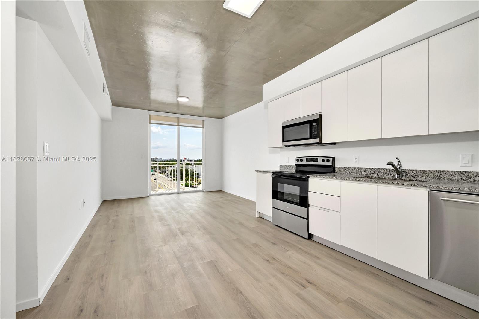 Introducing a brand-new boutique building on 125th Street! This elegant 3-bedroom, 2-bath unit features a spacious balcony and sleek laminate flooring throughout. a live-work unit is a space that combines your workspace with your living quarters so you essentially work from home but with a dedicated section for your office. .The building offers amenities, including a gym, a conference room, and secure access with a fob-operated elevator. We also offer Electric Vehicle charging stations on site . Pet-friendly and equipped with an in-unit washer and dryer, as well as a fully equipped kitchen. Enjoy a quick and easy application process with just the first month's rent and a security deposit required. We work with section 8 !!!