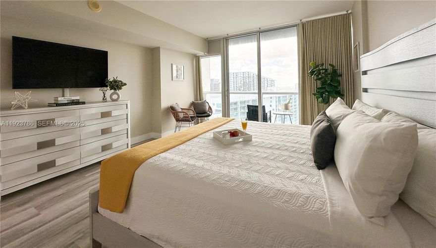 **INVESTMENT OPPORTUNITY** Excellent ROI potential thanks to its eligibility for daily rentals—a strong advantage in Miami’s short-term rental market. Seller is motivated, so bring your offer and secure a high-floor studio in one of Miami’s most iconic addresses. This elevated studio on the 44th floor of Icon Brickell offers sweeping views of Miami’s skyline and Biscayne Bay through floor-to-ceiling windows. The open layout features modern finishes, a well-appointed kitchen with premium appliances, and a spa-style bathroom for a relaxing, resort-like feel.
Residents and guests enjoy access to one of Miami’s premier amenity collections, including a massive two-acre pool deck with an Olympic-length pool, hot tub, and abundant lounge space. The full-service spa and state-of-the-art fitness center offer steam rooms, saunas, and cold plunges for total wellness. On-site dining options, attentive concierge and valet services, and Philippe Starck–designed common areas elevate the experience even further.
Located in the heart of Brickell, the building sits steps from Brickell City Centre, top restaurants, nightlife, parks, and the Metromover for easy transportation. Chic, convenient, and undeniably Miami, this studio is an ideal urban retreat in one of the city’s most iconic addresses.