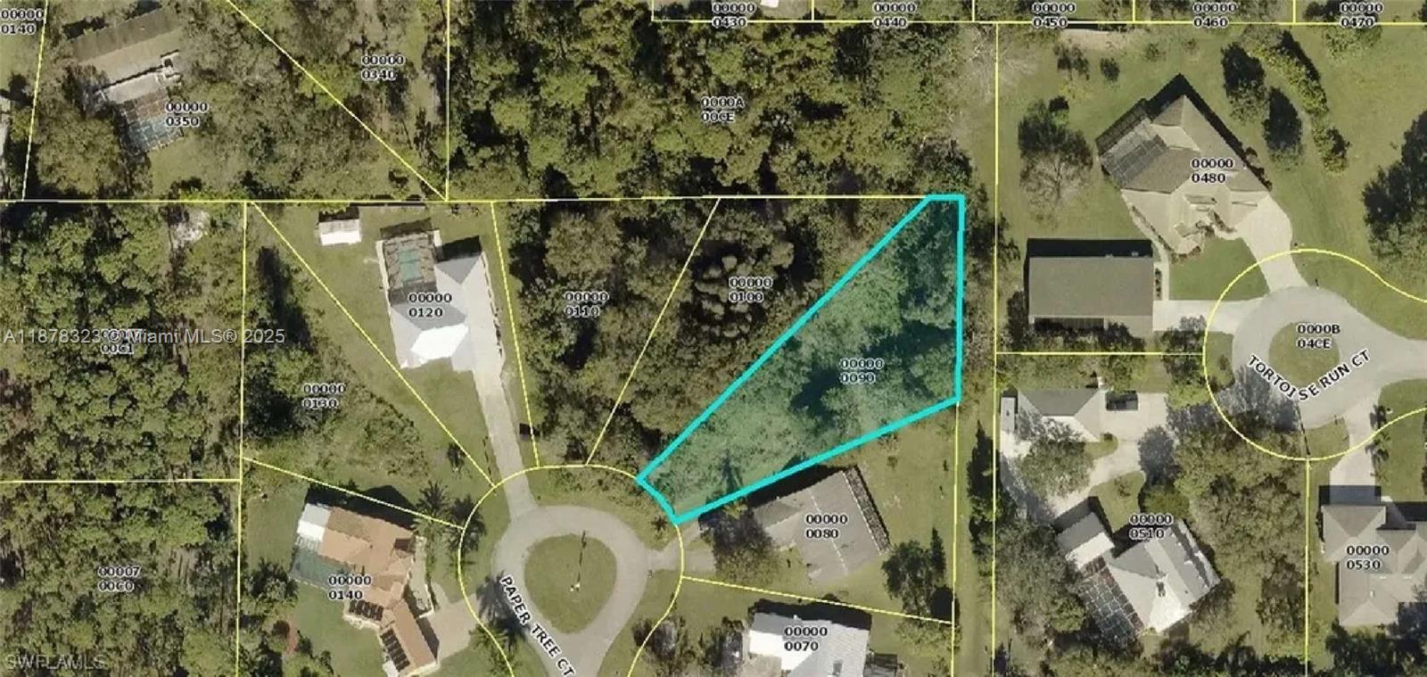 Oversized cul-de-sac lot in an upscale North Fort Myers neighborhood. The perfect location to build your dream home, featuring a paved road and a quiet, private setting.