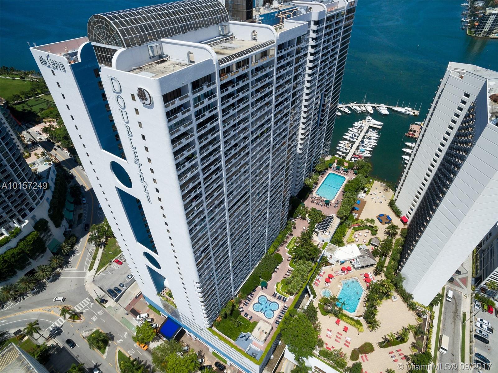 Spacious and impeccably remodeled luxury apartment. Elegantly furnished by KOM Furniture. White ceramic flooring throughout, new gourmet kitchen with stainless steel appliances, designer bathrooms and walk-in closets. New impact glass sliding doors. Step into your private balcony and enjoy the incredible marina and water views!