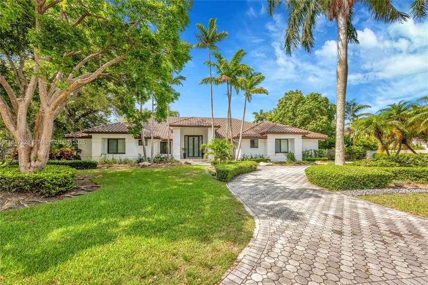 Located in the gated community of Old Cutler Groves South, this meticulously updated 5 bedroom, 4.5 bathroom home features high ceilings and tall impact glass windows and doors throughout, filling the house with sunlight!  The floorplan includes a foyer entry, formal living and dining rooms, and a renovated eat-in kitchen open to the large family room overlooking the covered patio, pool, and lovely koi pond.  The primary bedroom includes a beautifully updated bathroom with separate tub and shower and dual vanities, as well as an ample walk-in closet.  3 additional bedrooms sit adjacent to the primary, with an additional bedroom/office off of the living room. 5 year old roof, laundry room, 2-car garage, 1 newer a/c, tennis courts within the community and so much more!