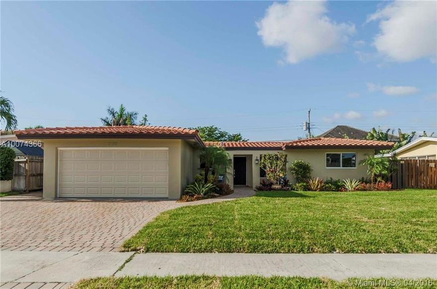 WOW!! Beautiful Tropical Oasis in the heart of desirable Imperial Point. Gorgeous designer remodeled pool home filled with upgrades including: Impact windows and doors, Quartz countertops, Stainless appliances, Recessed lighting, Crown moldings, Exquisite bathrooms and Rich landscaping. The pool area is surrounded by lush landscaping and offers the perfect retreat from daily stress or a stage for great parties! This delightful home offers indoor and outdoor Florida living at it's finest!