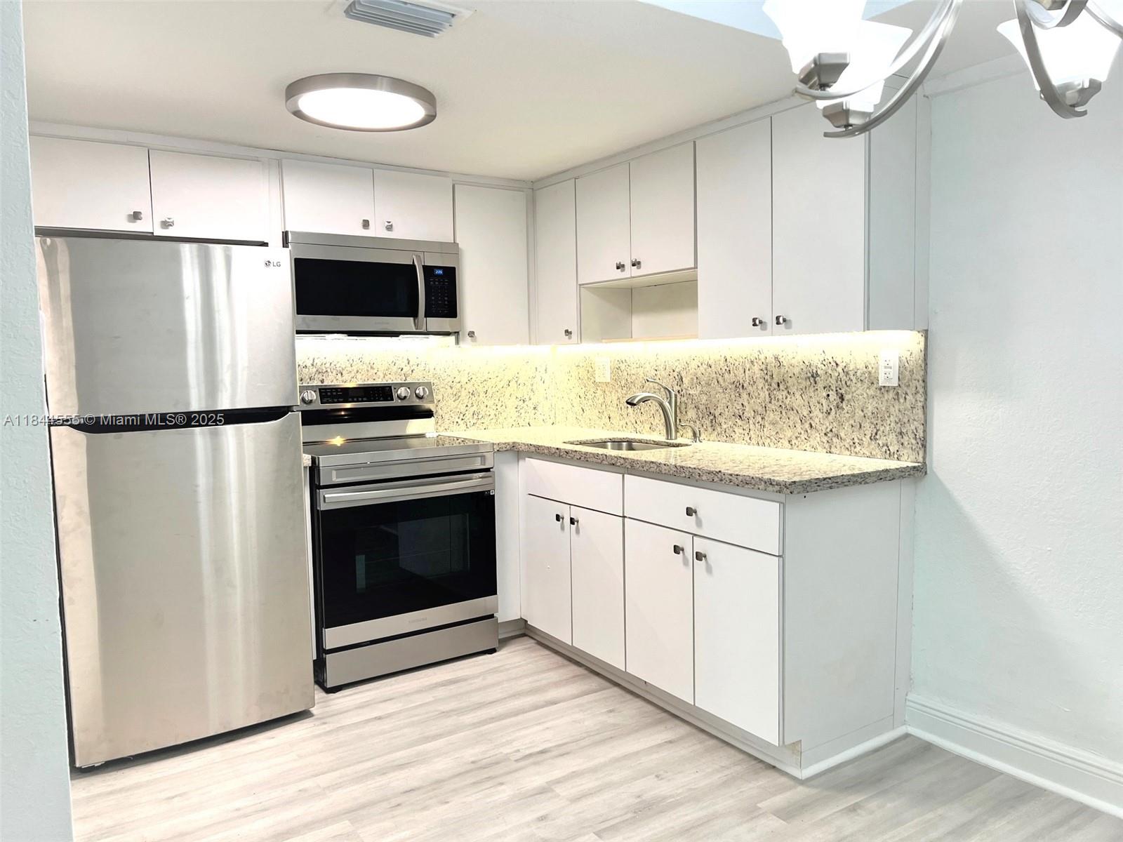 The beautiful and bright one BR/one BA apartment has all new flooring, stainless-steel appliances and washer/dryer. Apartment includes beautiful acrylic kitchen cabinets, blinds, and central a/c. All within a quiet building with gated parking that is centrally located to the east of Biscayne Blvd near the bay at 63rd St. For more information, please call us today. Available immediately.