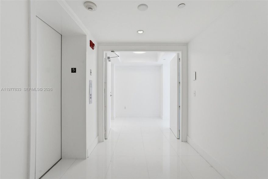 Impeccable 3-bed, 3-bath residence in Coconut Grove’s iconic Grovenor House, offered at the lowest price per SqFt for a 3/3 in the building. This light-filled, east-west facing unit is accessed via private elevator and features an open floor plan, chef’s kitchen with Miele/SubZero appliances, and Snaidero cabinetry. Enjoy two private balconies with limited bay views and lush tree-top vistas. All bedrooms have en-suite baths and custom closets; the spacious primary suite includes two walk-ins, balcony access, and a spa-like bath. Full-size laundry room, 2 assigned parking spaces, and storage included. Unbeatable value in a full-service, luxury building steps from parks, marinas, and Coconut Grove’s best dining.