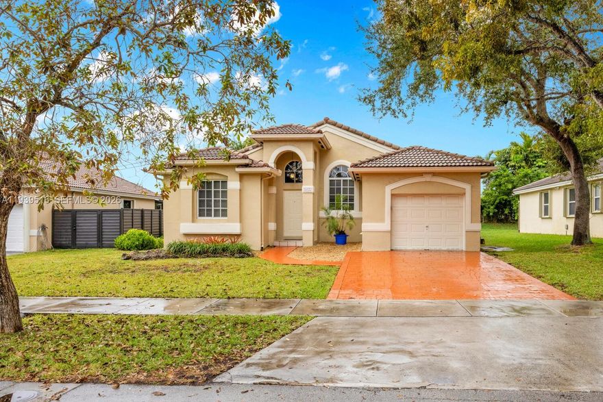 Your search is over! Beautifully maintained home located in the semi-private community of Emerald Oaks with only 25 homes in south Palmetto Bay.  Tile floors throughout, a split floor plan, high ceilings, and abundant natural light. Features include an updated guest bathroom, a spacious eat-in kitchen with granite countertops, family room off the kitchen opens to backyard, plus formal living and dining rooms—perfect for entertaining. All bedrooms have custom closets! Conveniently close to shopping, top-rated schools, and places of worship. This home offers 3 bedrooms, 2 bathrooms, a one-car garage, and is available immediately. Flood Zone “X”.