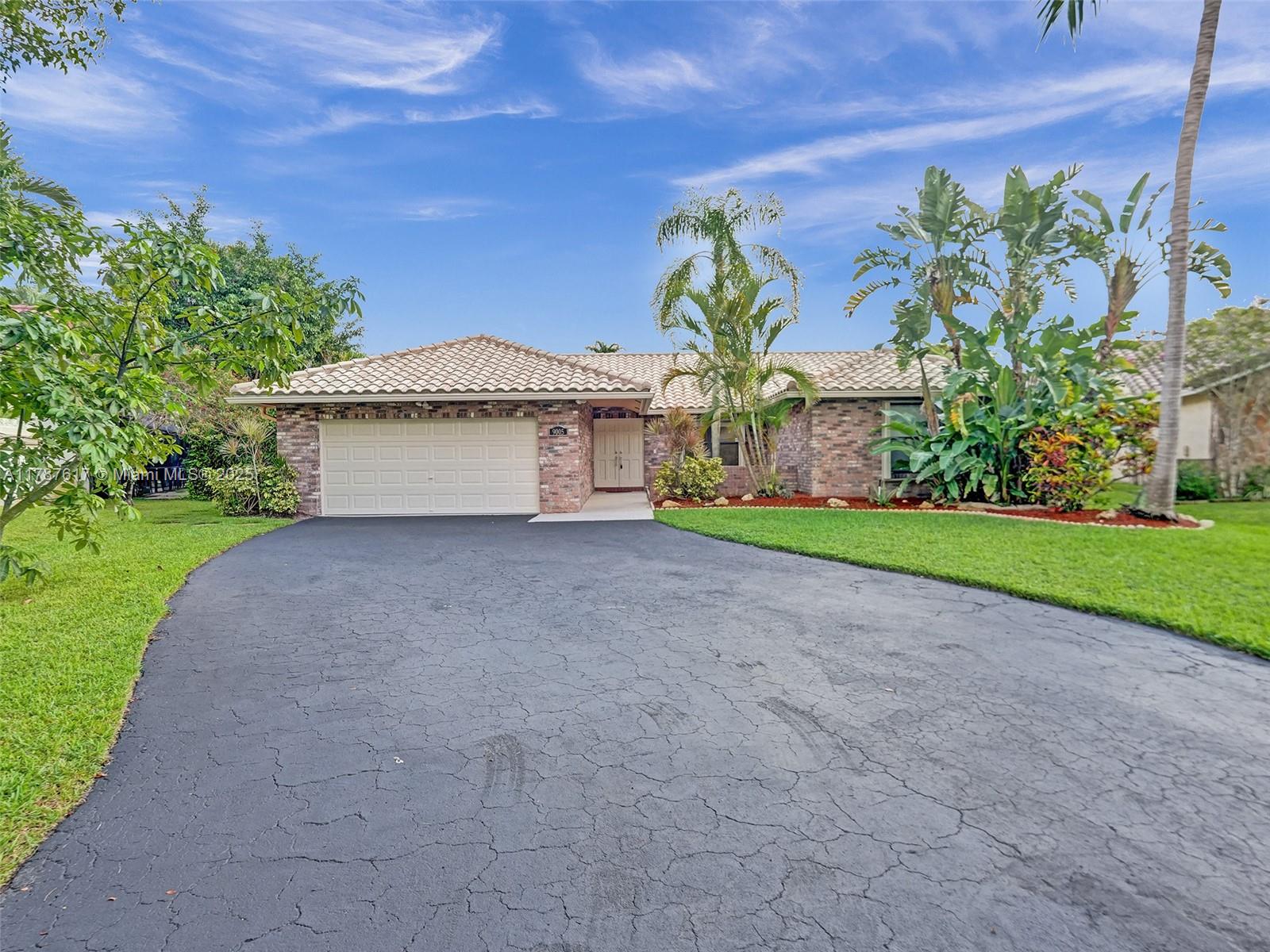 9005 Nw 49th Ct, Coral Springs, Broward County, Florida - 4 Bedrooms  
2 Bathrooms - 